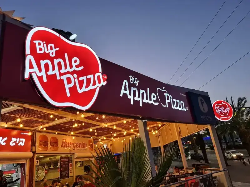 Big Apple Pizza shaped illuminated logo sign on aluminum plate with iron construction — SignWorks