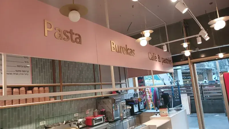 Pasta and burekas cafe restaurant signage with gold letters